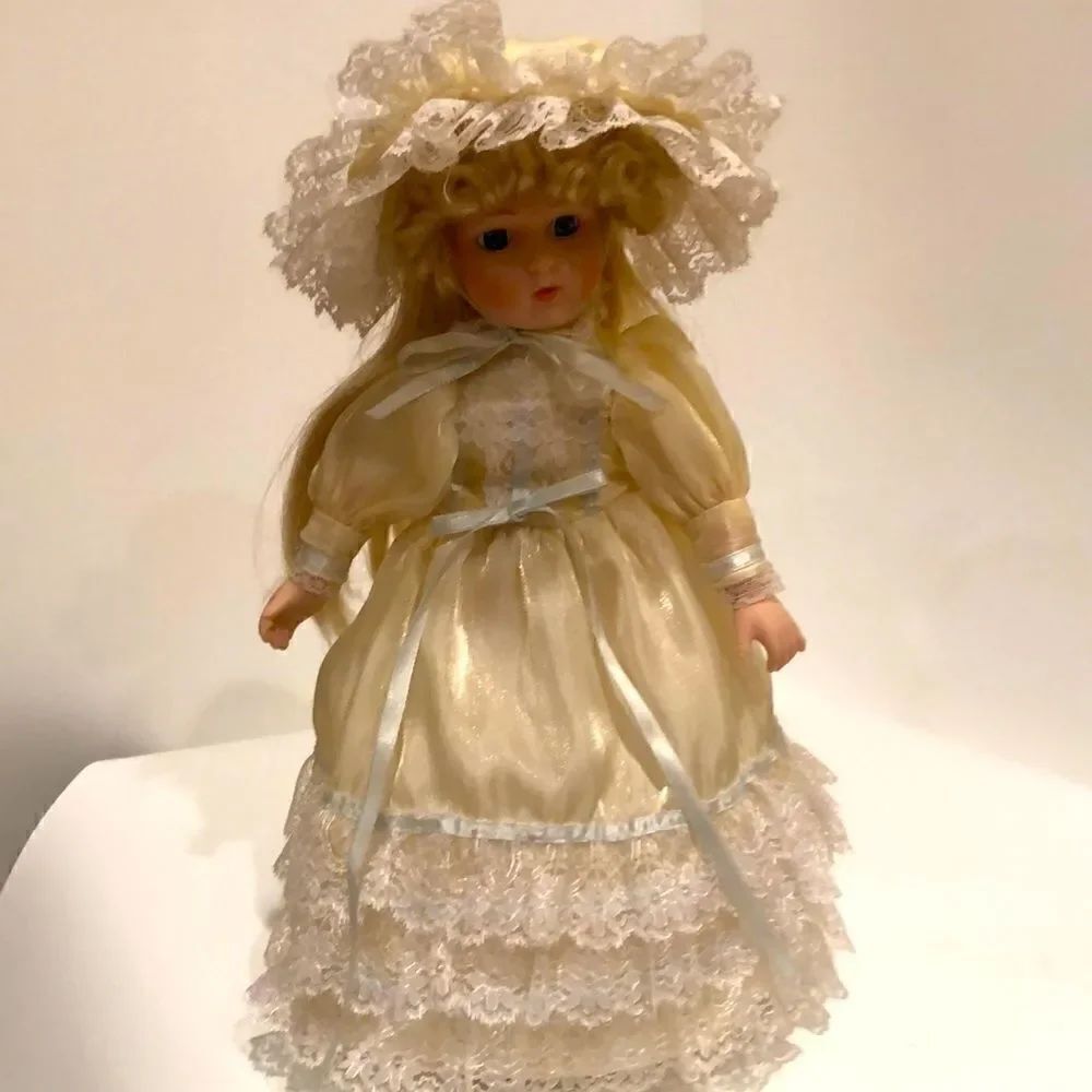 Porcelain doll 14”